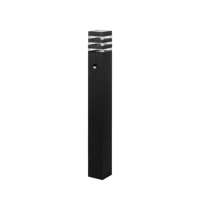 Stylish stainless steel outdoor bollard light illuminates garden pathways.